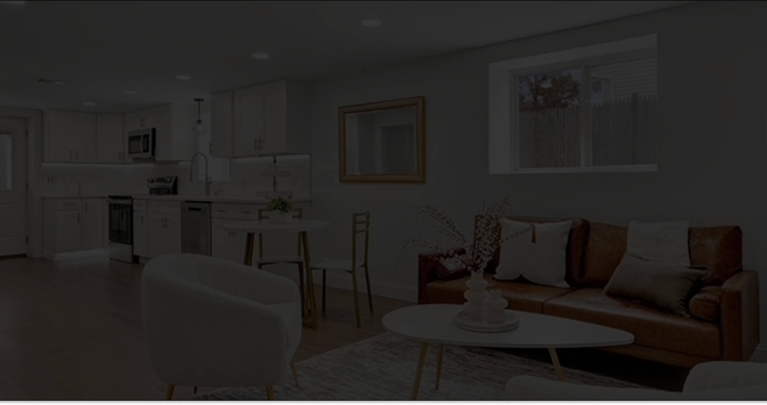 Photo of a staged kitchen and living area